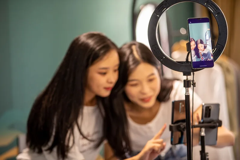 Smartphone screen showing a TikTok LIVE broadcast in progress
