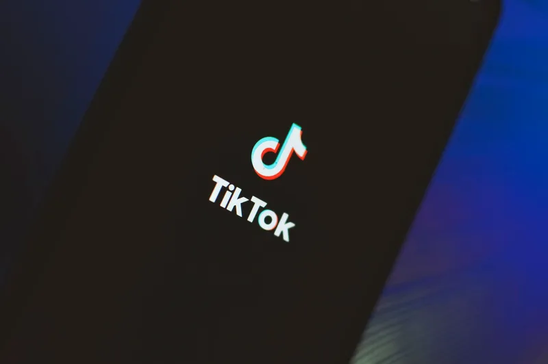 Smartphone screen showing a TikTok video with rapidly increasing view counter