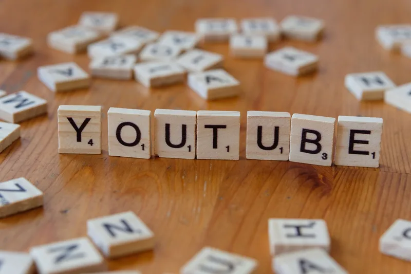 Illustration showing YouTube subscriber growth tactics with a rising subscriber count graph