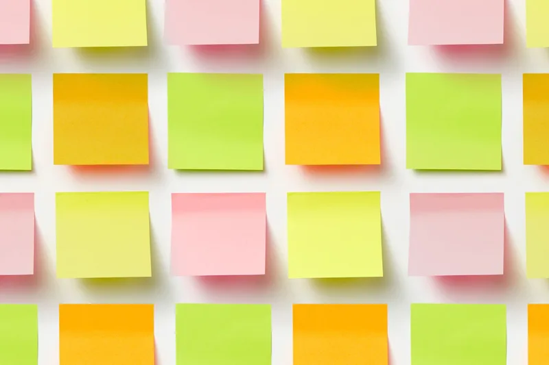 Grid of colorful sticky notes arranged in an organized pattern
