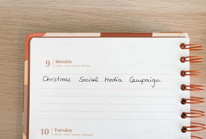 Open content planning notebook with social media campaign notes, representing a structured Twitter content strategy