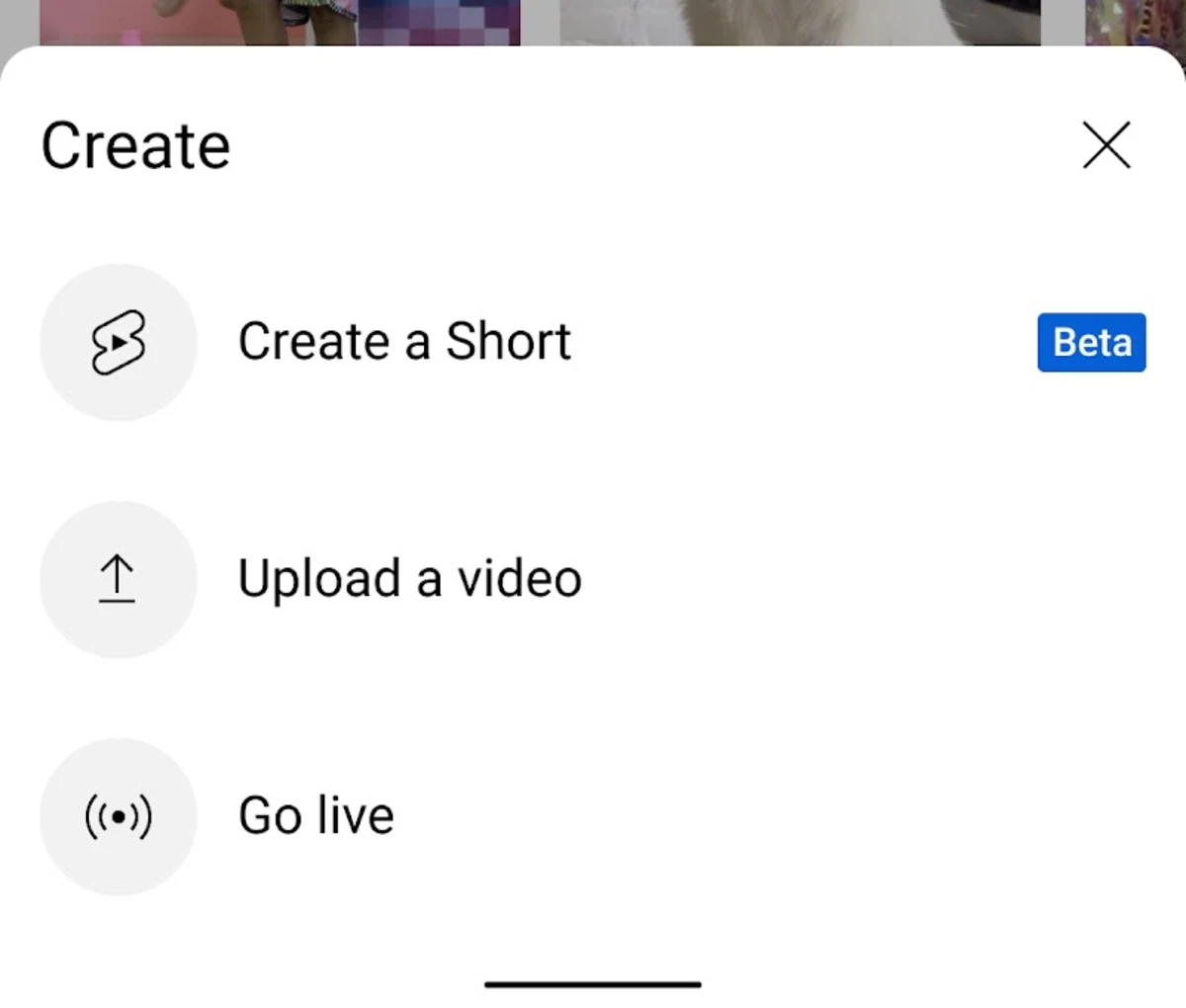 YouTube app Create menu showing Create a Short, Upload a video, and Go live options